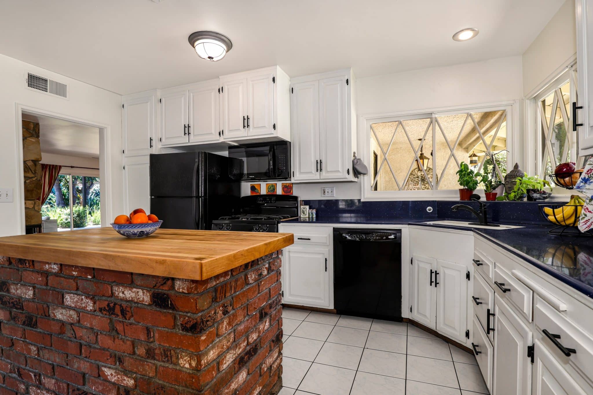 Resort-Style Pool Home on Half-Acre Lot in Woodland Hills